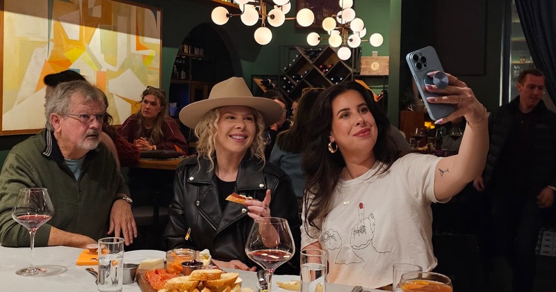 Three friends taking a selfie together