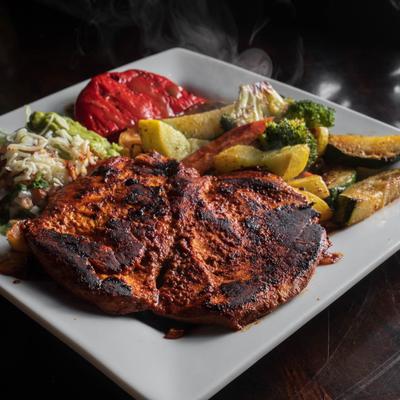 Pollo en Adobo grilled chicken meal.