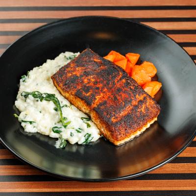 Blackened salmon with mashed potatoes.
