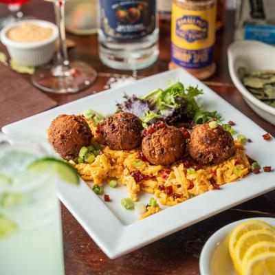 Hush puppies with pimento cheese and candied ham.