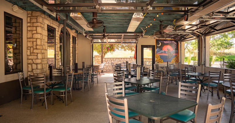 Exterior, tables and chairs on covered patio