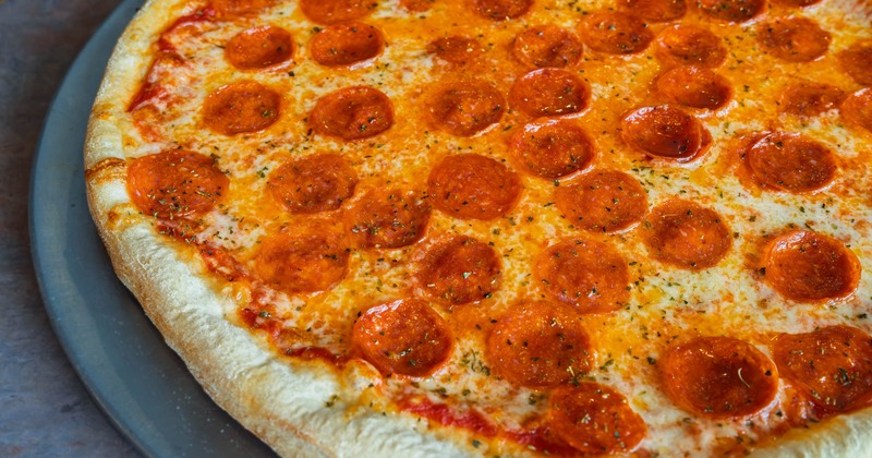 Pepperoni pizza with melted cheese and seasoned crust