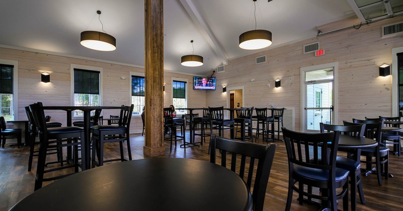 Interior, seating area with tables and chairs