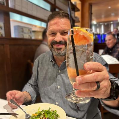 Ciro holding an Italian Spritzer.
