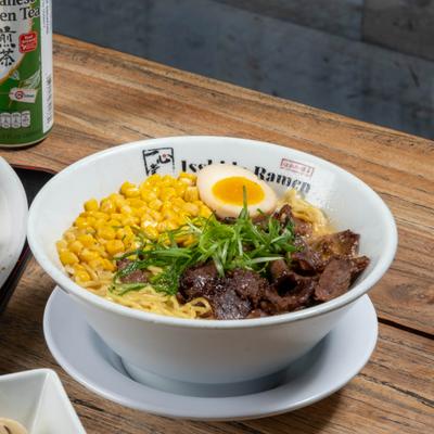 Short Ribs Steak Ramen with corn and a half-flavored soft-boiled egg.