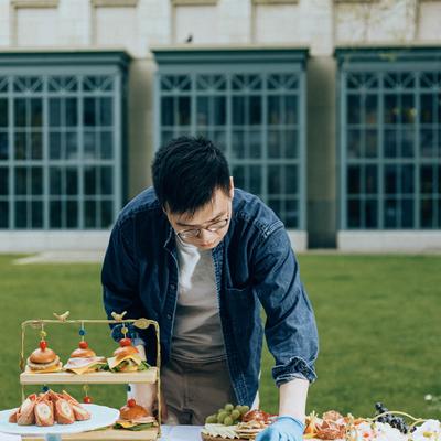Employee preparing food.