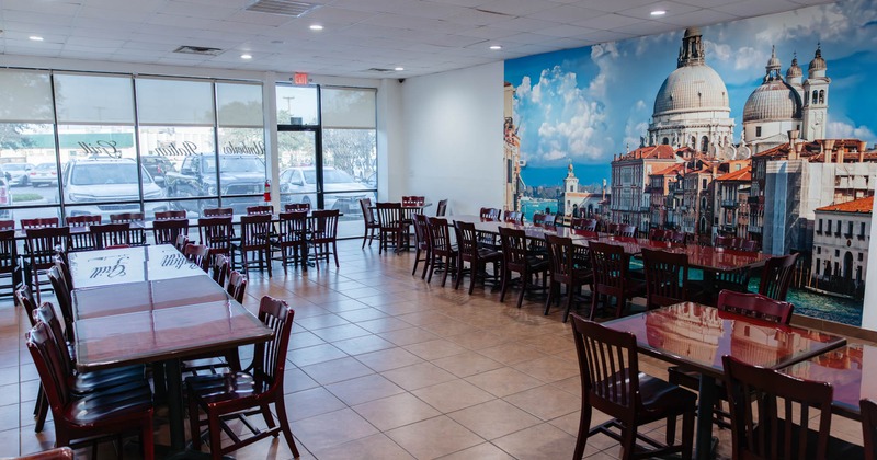 Interior, dining area with a huge photo on the wall