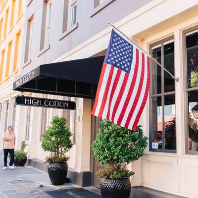 Front entrance and an American flag.