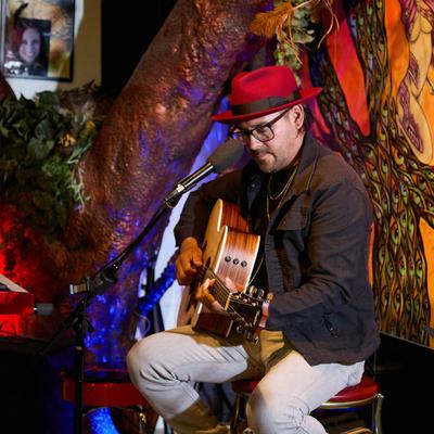 A guitarist on the stage.