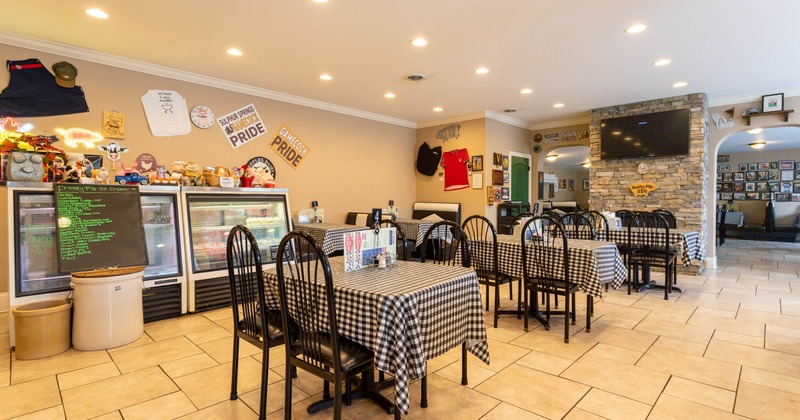 Interior, tables and chairs ready for guests