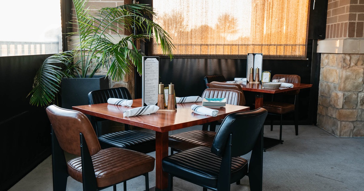 Interior, tables and chairs ready for guests