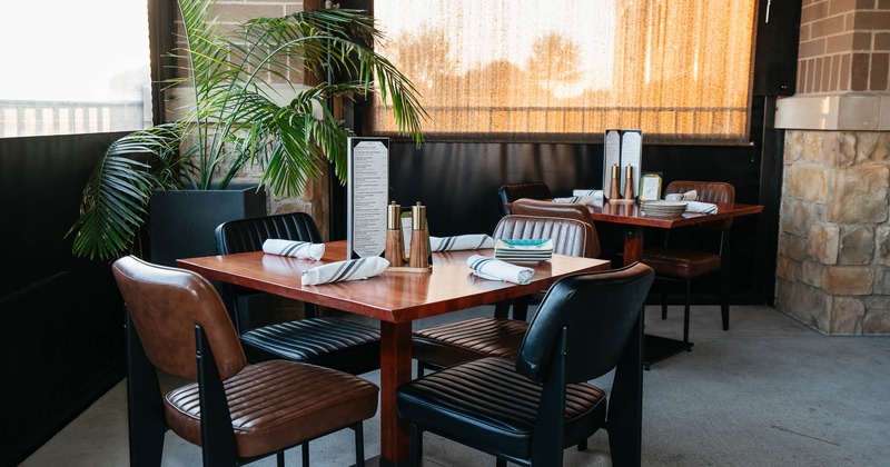 Interior, tables and chairs ready for guests