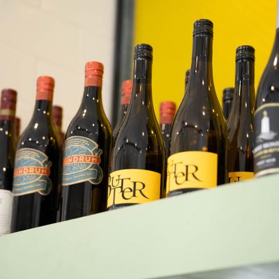A shelf of wine bottles.