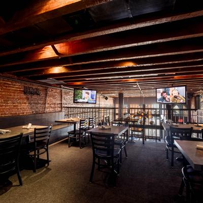 Interior, bar tables and chairs.