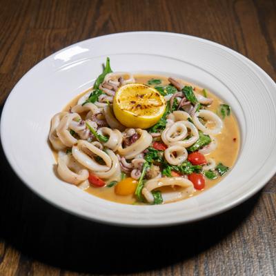 Sauteed calamari, garlic white wine, capers, tomato, sauteed spinach.