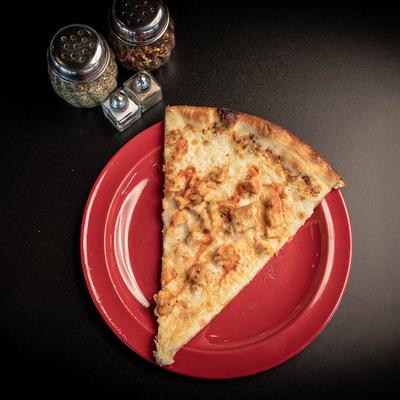 A slice of Buffalo Chicken Pizza.