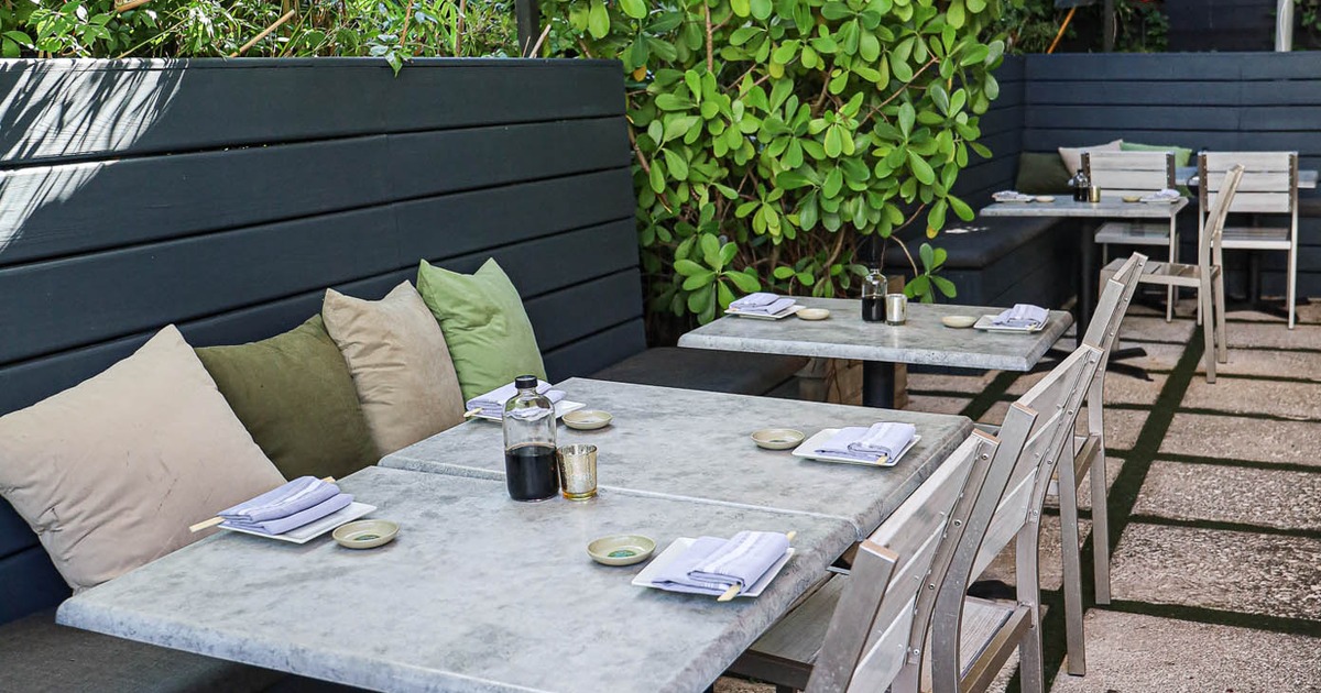 Exterior, set tables ready for guests