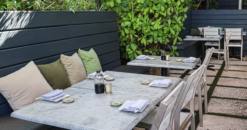 Exterior, set tables ready for guests