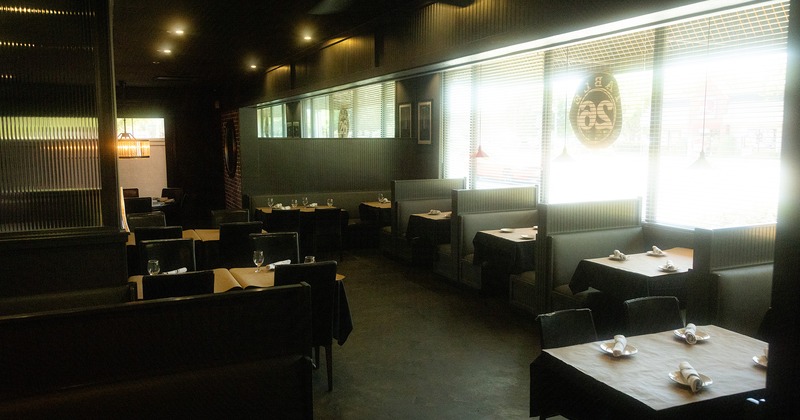 Restaurant interior, dining area with set tables ready for guests