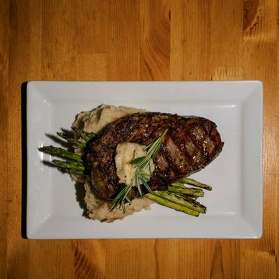 Ribeye steak, served, top view.