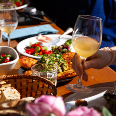 outdoor supra with unfiltered wine