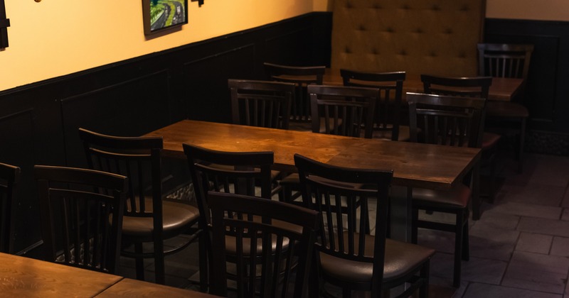 Interior with wooden tables and chairs