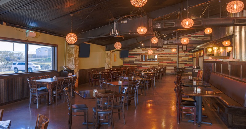 Interior space with guests tables and seats