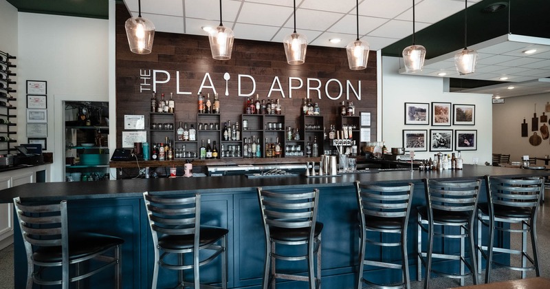 Bar, chairs and drink rack behind