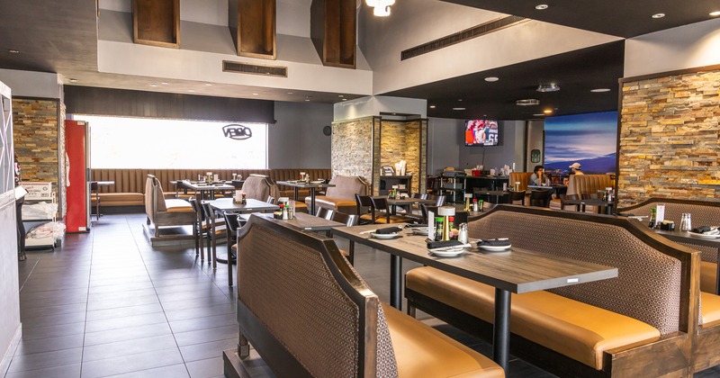 Cozy interior dining area with set tables ready for guests
