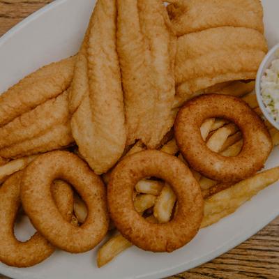 Fried flounder served with fries, coleslaw and onion rings.