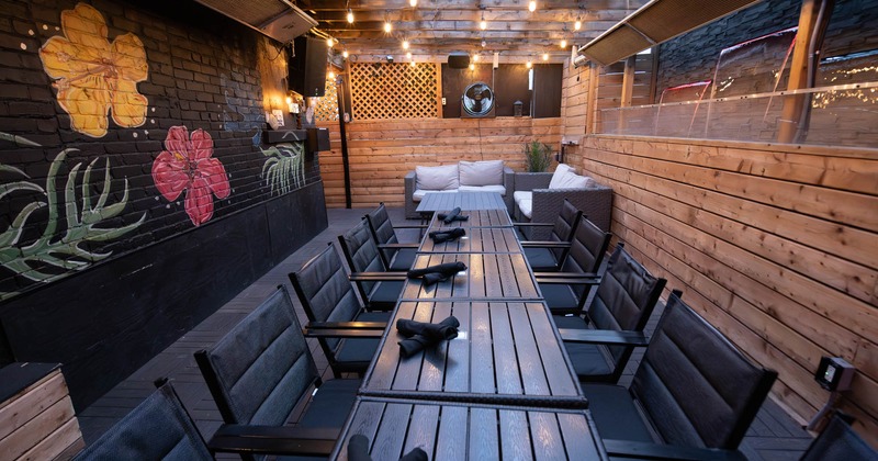 Private space, tables, chairs and lounge seating