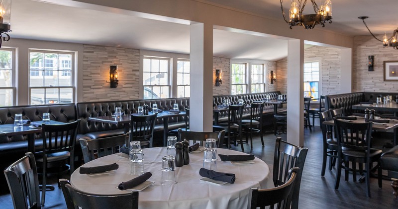 Interior, table in front ready for a diner, diner room behind