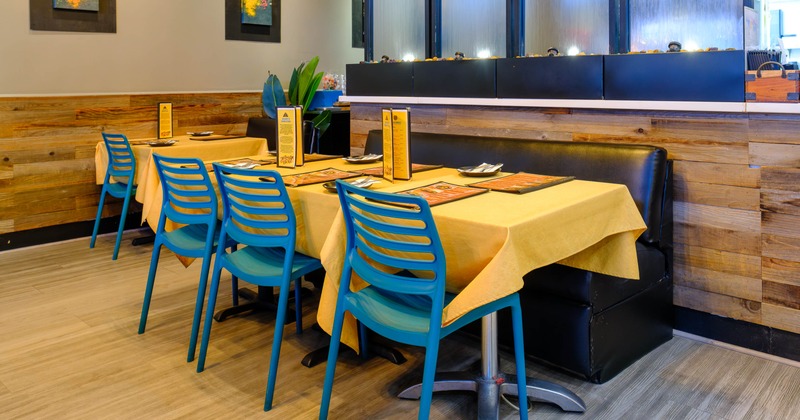 Interior, tables and chairs in dining area
