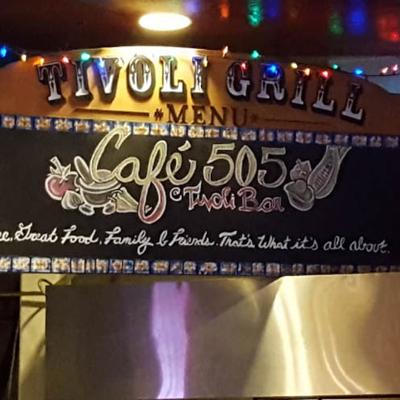 Chalkboard menu sign for a restaurant.