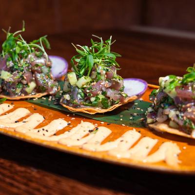 Tostadas with raw ahi tuna.