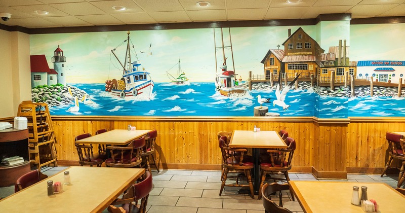 Dining area with painting wall