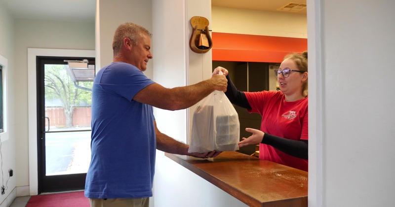 Pick up counter, customer and staff