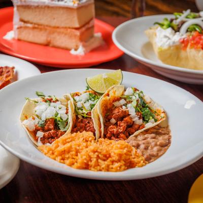 Various dishes and drinks on the table, angle view