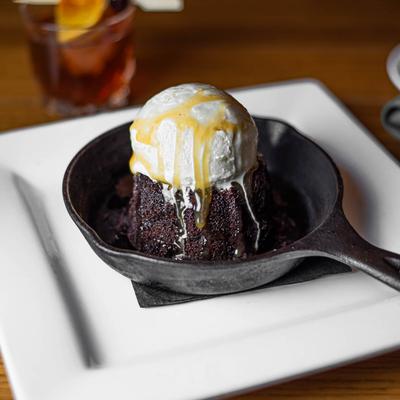 Chocolate Lava Cake topped with vanilla ice cream.