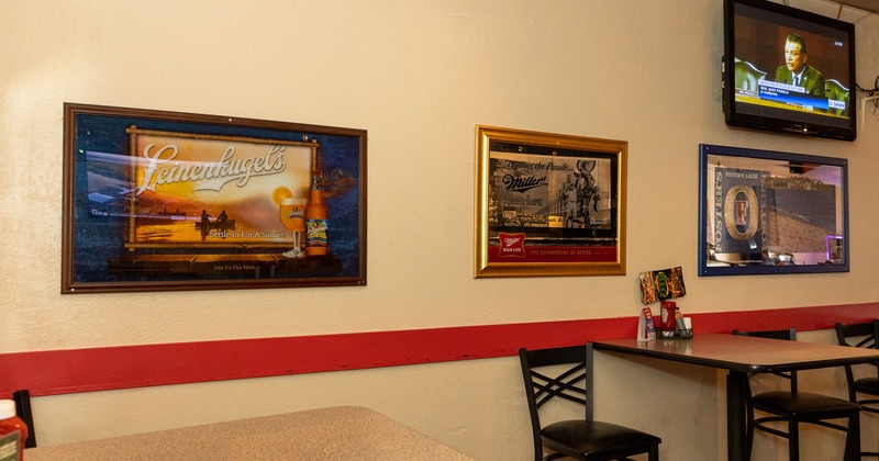 Interior, pictures hung on wall