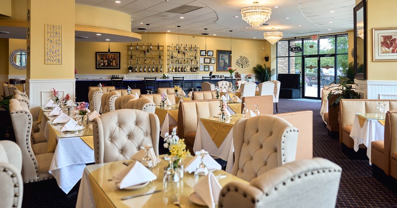 Interior, tables and chairs ready for guests