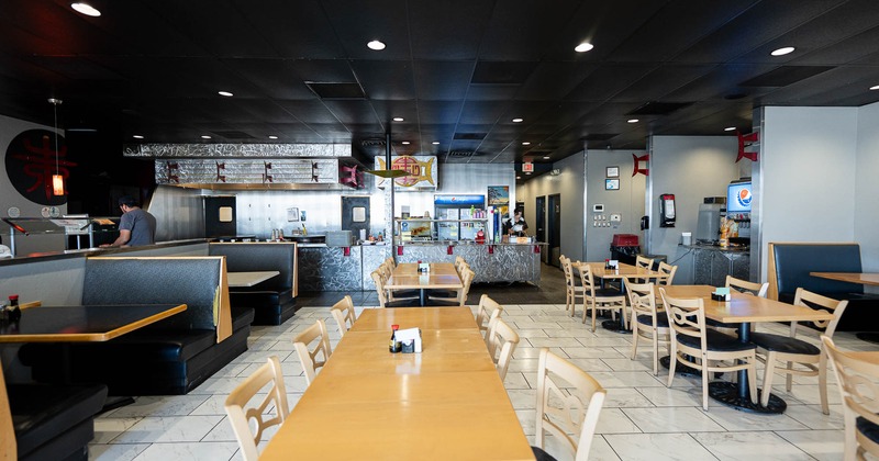 Interior, spacious dining area with tables and chairs