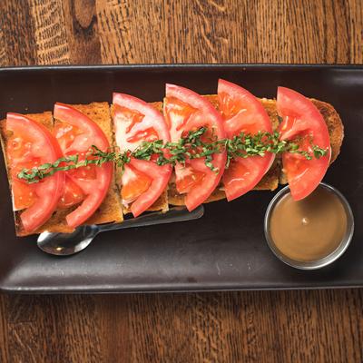 Tomato salad, dip on the side