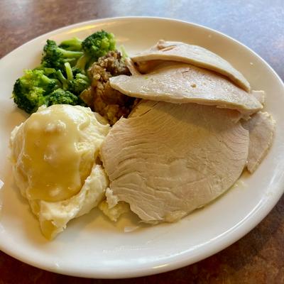 Roasted turkey breast with sides.