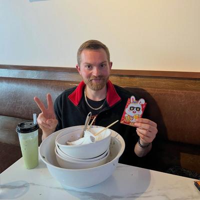 Customer with soup bowls.