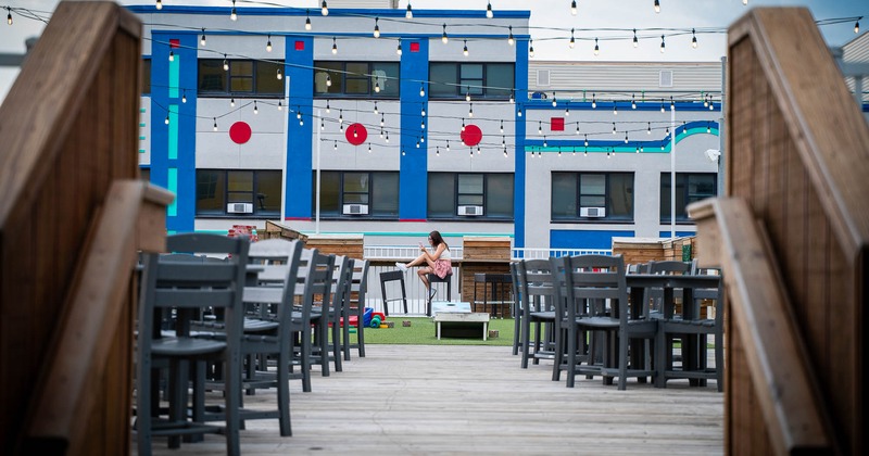 Exterior, tables and chairs with view