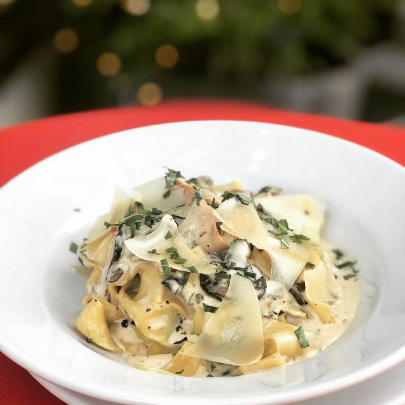 Fresh pappardelle with shiitake, crimini and oyster mushrooms.  Fresh thyme, rosemary, tarragon, cream and white wine - add cascioppo brothers sausage for an additional charge photo