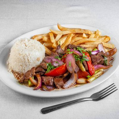 Beef tenderloin, tomatoes, rice, sauteed red onions, served over French fries.
