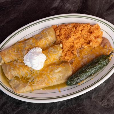 Chicken Enchiladas, rice, refried beans, and grilled jalapeno.