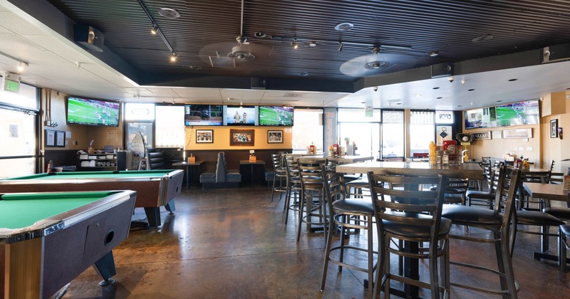 Part of the seating area with pool tables